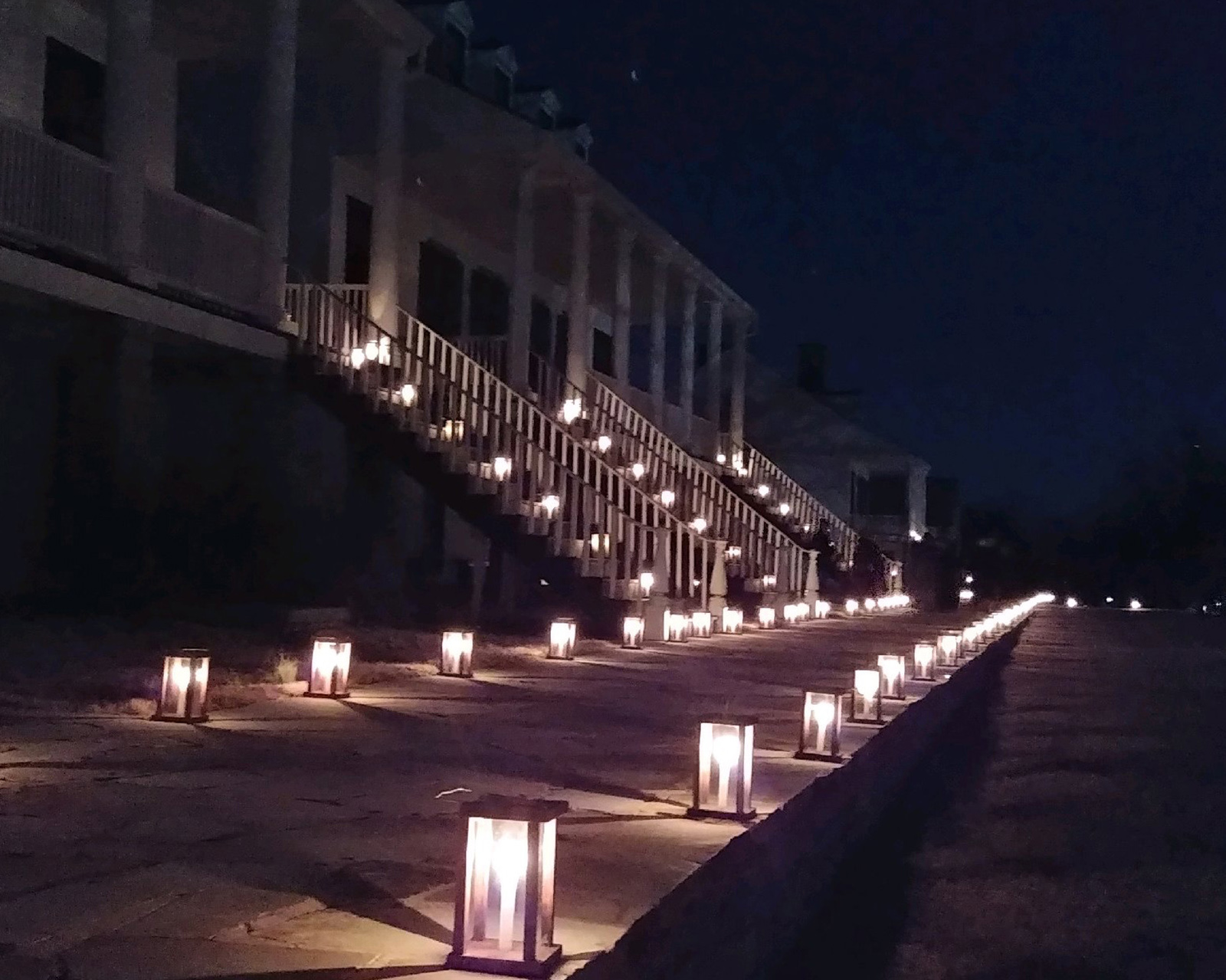 Candle lanterns lighting Officer's Row. Candle lanterns lighting Officer's Row.