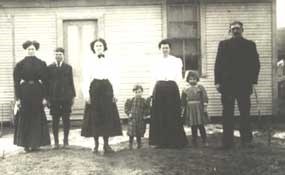 family photo of William Barnett which shows his missing left hand