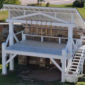 aerial photo of gallows reconstruction with 6 nooses hanging from cross bean aerial photo of gallows reconstruction with 6 nooses hanging from cross bean