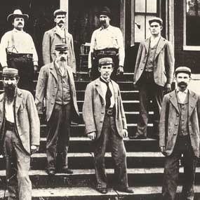 US jailers and guards on courthouse steps