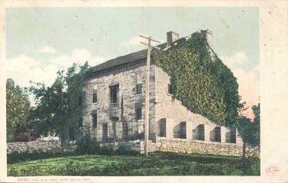 postcard showing fort wall next to Commissary postcard showing fort wall next to Commissary