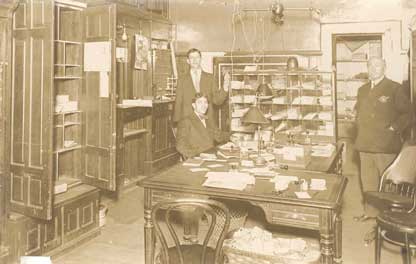 three men inside an office in federal courthouse on Sixth Street