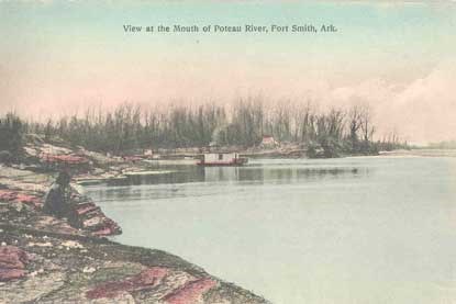 young boy fishing on rock landing of Poteau River