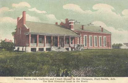 rare postcard of courthouse and jail building showing new courthouse on left and gallows on right