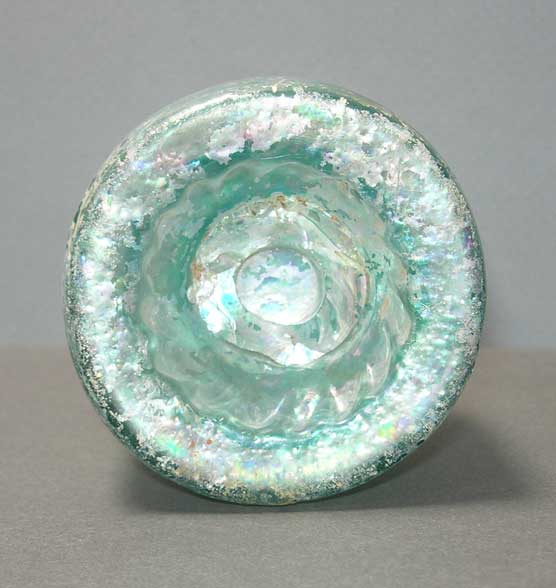 bottom of bottle base showing indentation