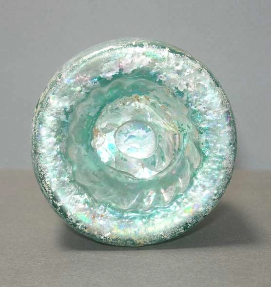 bottom of bottle base showing indentation