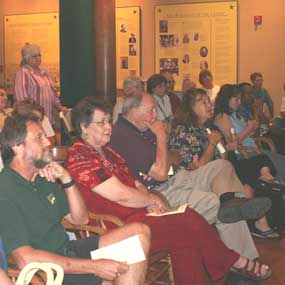 spectators at living history program in historic courtroom