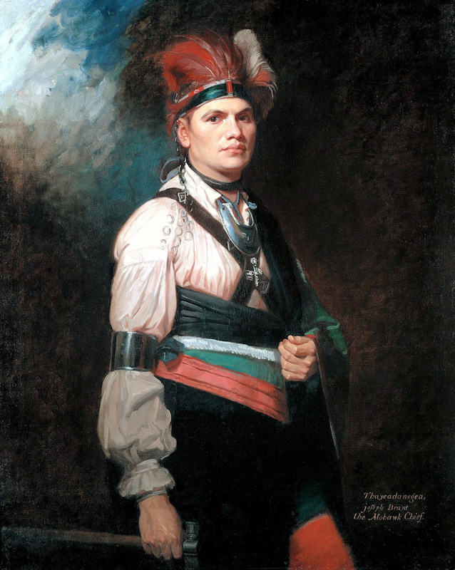A period painting of a man wearing colorful clothing and a blanket draped to his side. He looks solemn. 