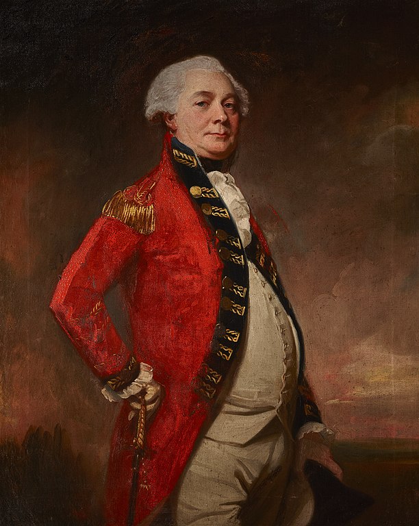 A man in a scarlet British uniform. He poses to his side and his tummy sticks out almost comically. 