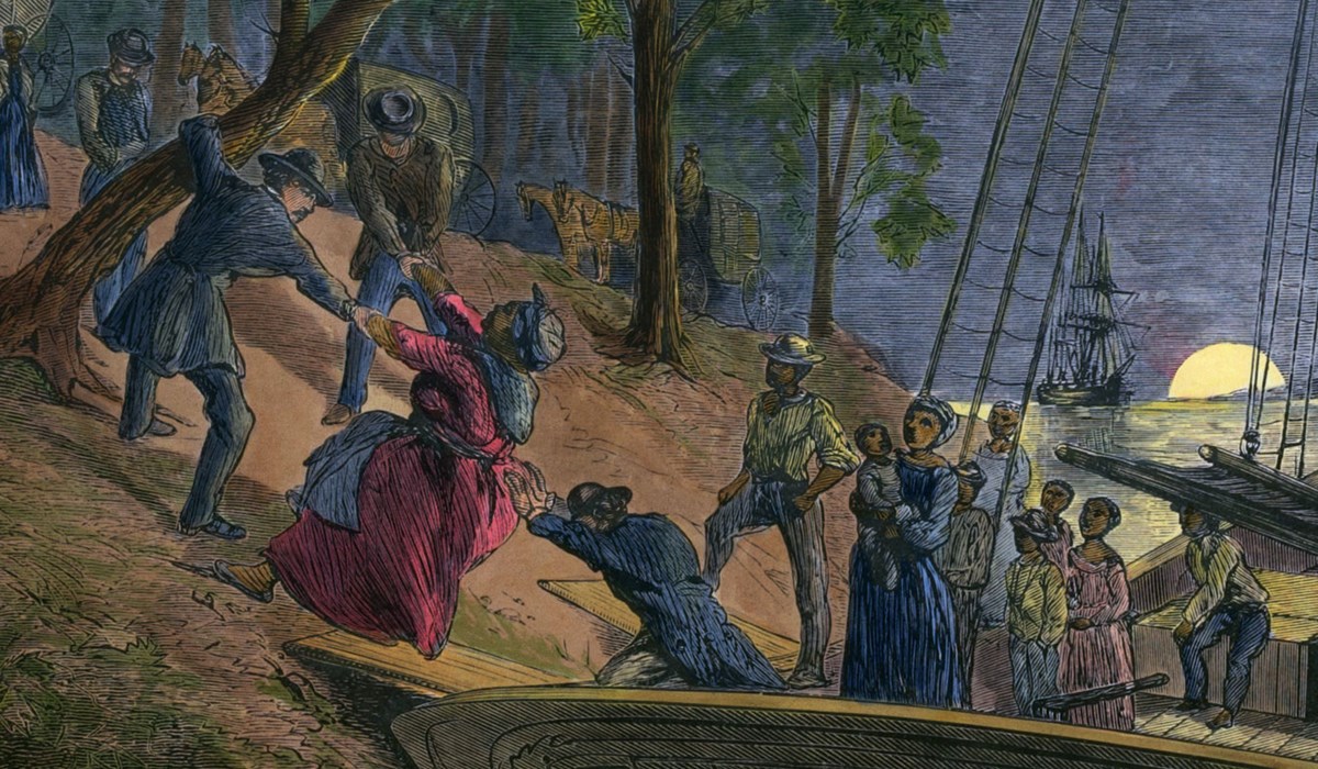 CreditNPS.UGRR.scene In the dark of night, several people climb from a small boat, up a river bank, and into a forest.