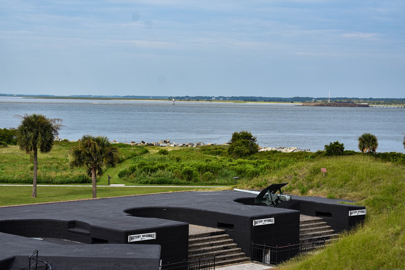 A view of Fort Moultrie's parade ground and batteries from high up. You can see the harbor and ocean in the far background.