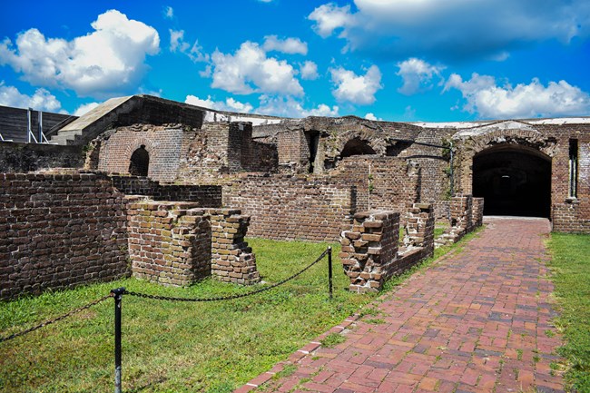 The historic 19th century bricks at Fort Sumter show heavy damage from the 1863 bombardments.