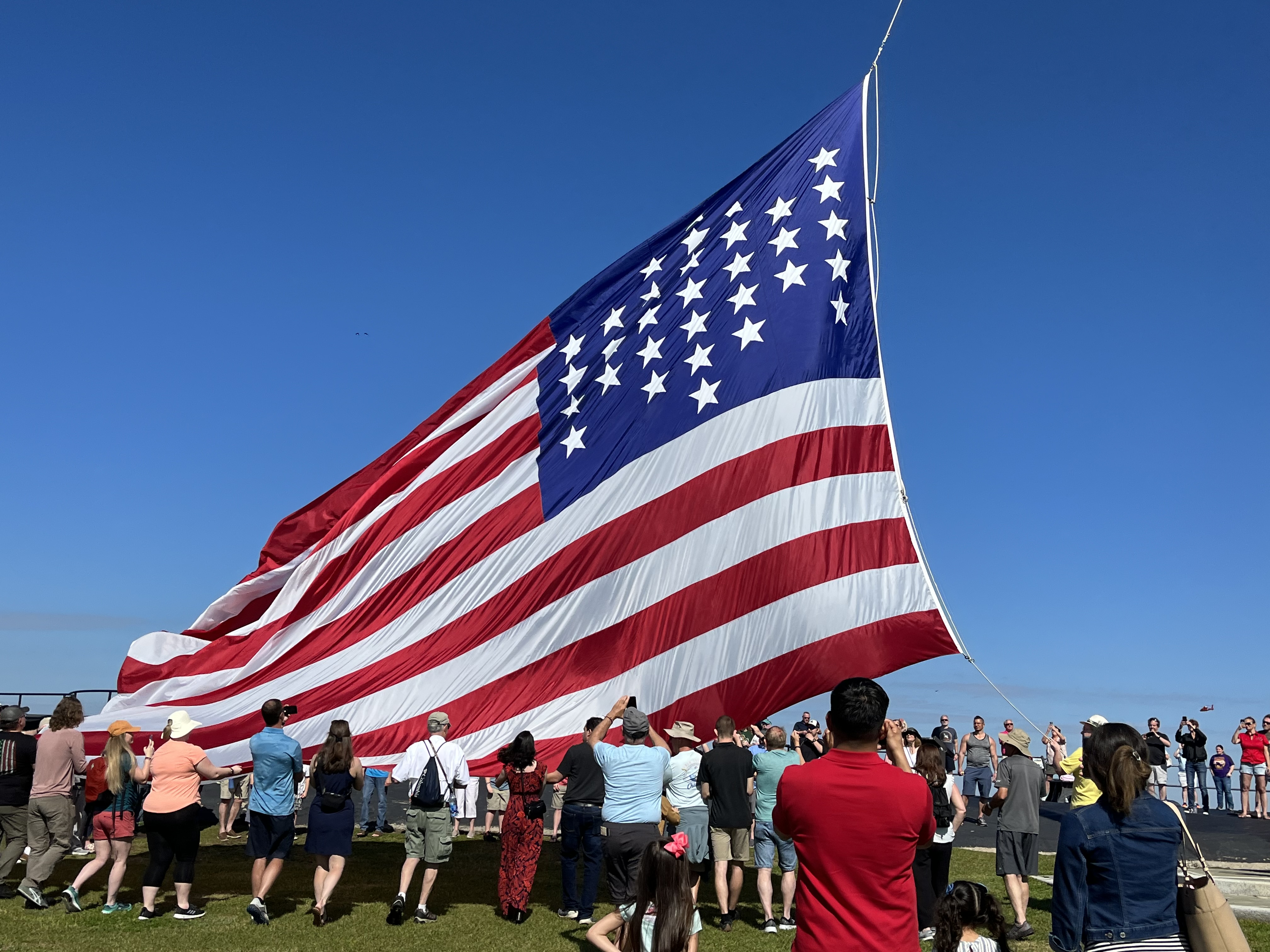 Raising the flag during First Shot events