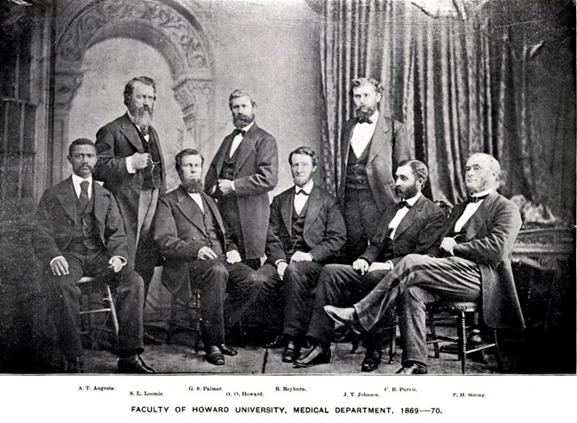 Group of Doctors seated and standing in 19th century professional attire