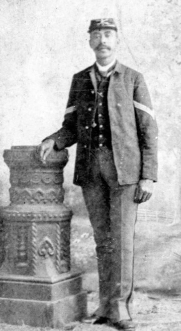 John Denney, African American winner of Medal of Honor, standing in his army uniform