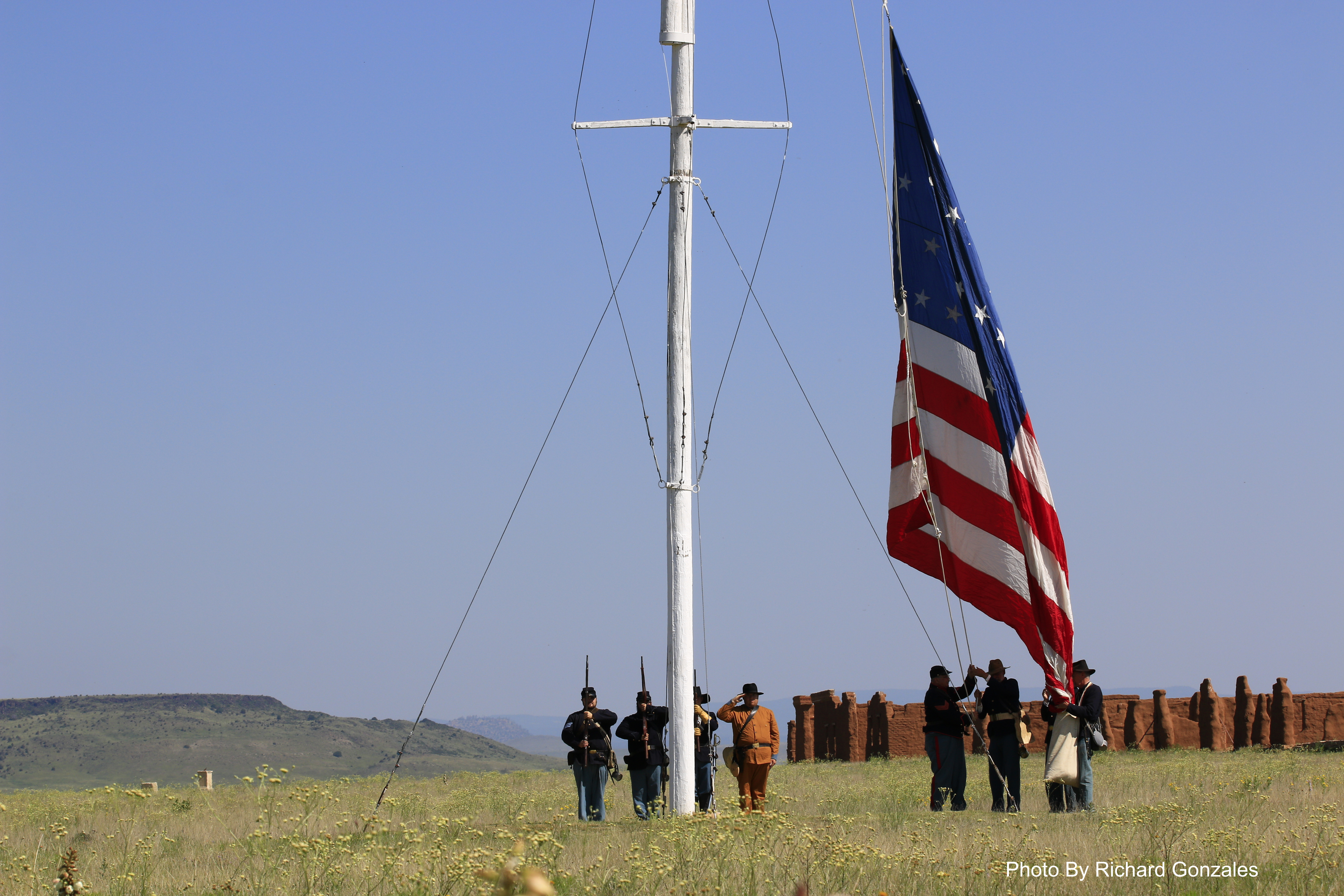 Living History regiment lowers American flag over Fort Union