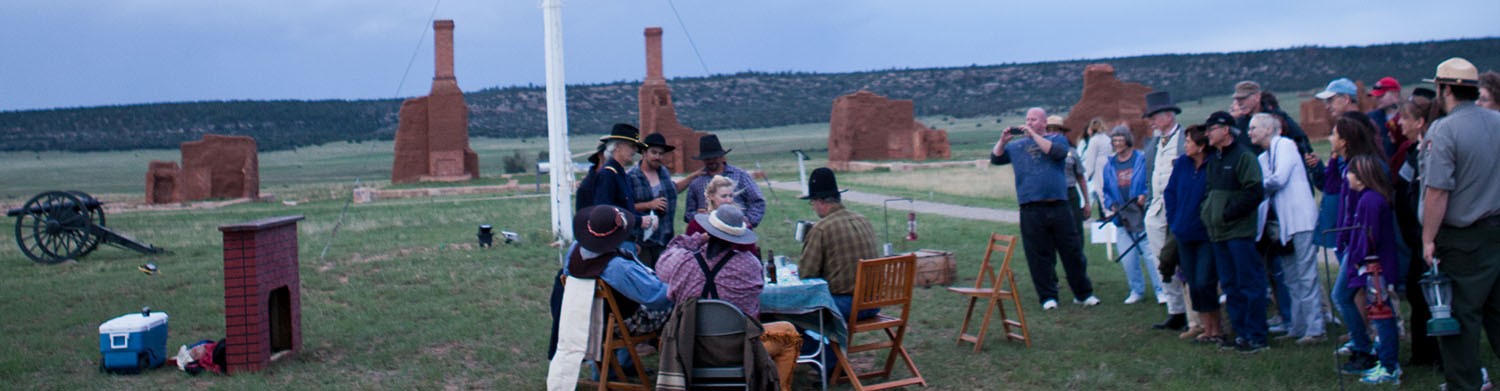 candlelight 2019 visitors watch living history skit at fort union