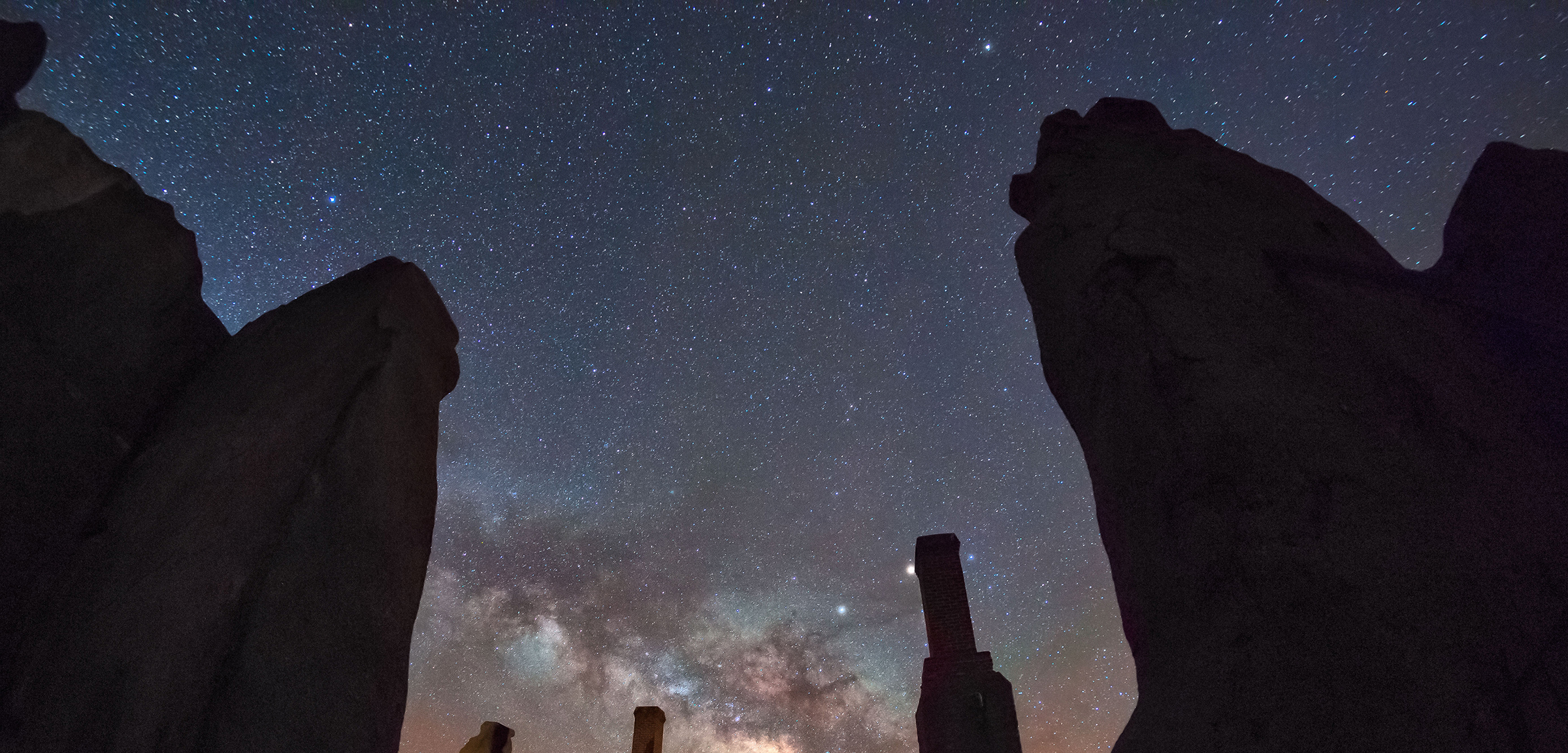 fort union night sky Milky Way and stars above ruins of adobe buildings