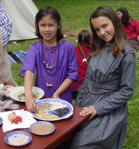 Image of two young volunteers at a special event