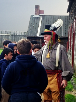 School Field Trip - Reggie A former educator and Fort Vancouver volunteer teaches school kid about the Hudson Bay Trade Shop.