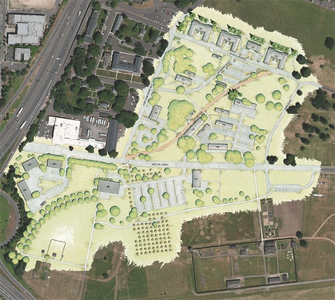 Artist's representation of the proposed site plan for Vancouver Barracks, superimposed on an aerial photo.