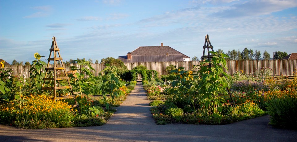 Photo of leafy garden in front of Fort Vancouver