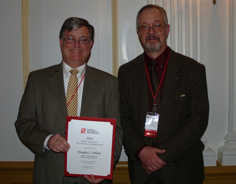 Doug Wilson receiving award