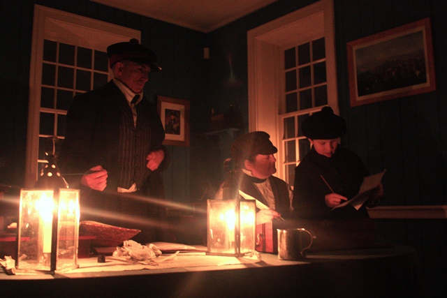 Volunteers portray clerks at the Fort Vancouver Counting House