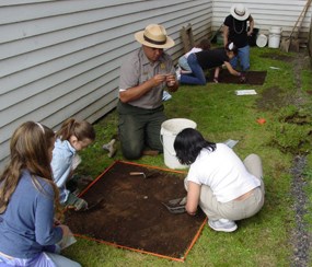 Kids and Rangers digging during a Kids Dig