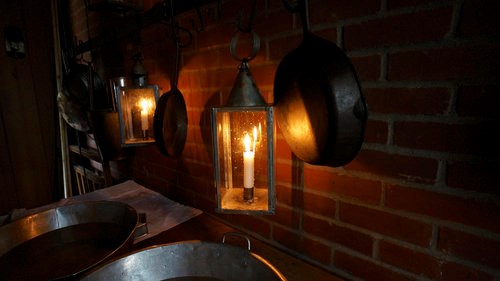 1840's Hudson Bay Company kitchen lit by candlelight