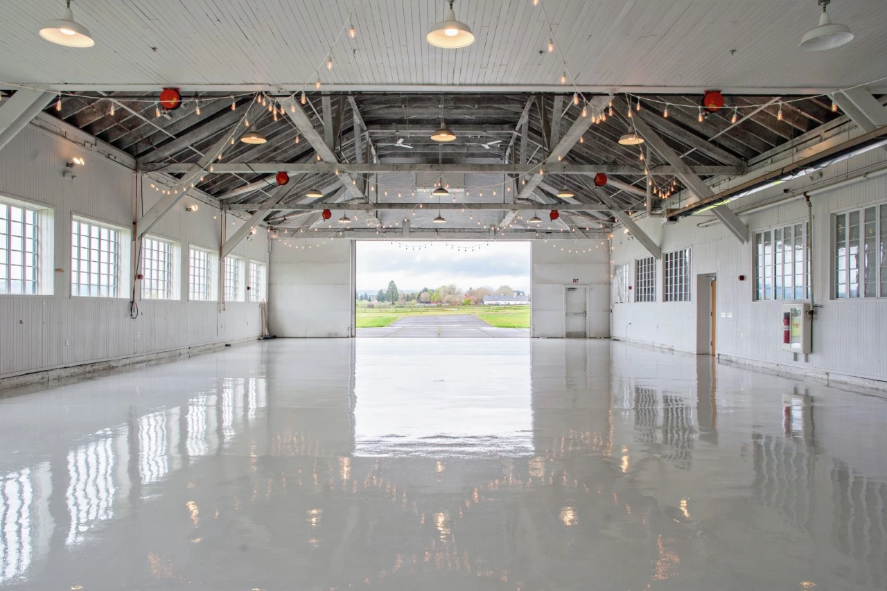 Historic Hangar Inside the Historic Hangar with a view out the hangar doors facing west.