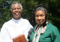 Two women dressed in historical clothing