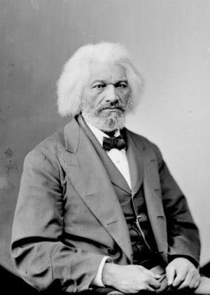 Frederick Douglass sits for portrait wearing suit