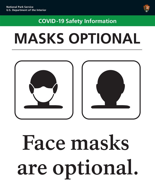 A sign showing that masks are optional in Federal buildings at Friendship Hill at this time.