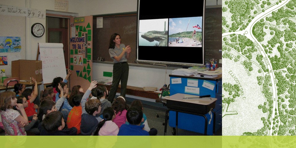 Park Ranger showing students a slide show as part of a Good Neighbors pre-vist Park Ranger showing students a slide show as part of a Good Neighbors pre-vist