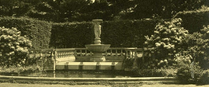 Fountain of the Muses in a garden setting Fountain of the Muses in a garden setting