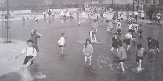 A c. 1910 photo of children playing in Washington Park in Chicago