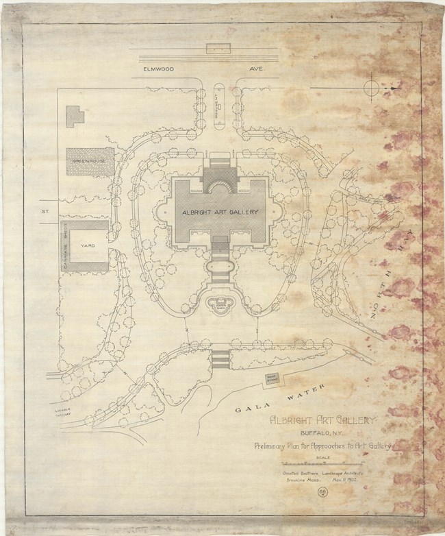 Map of park with building for art gallery at the center, trees and a large path surround and behind is a body of water.