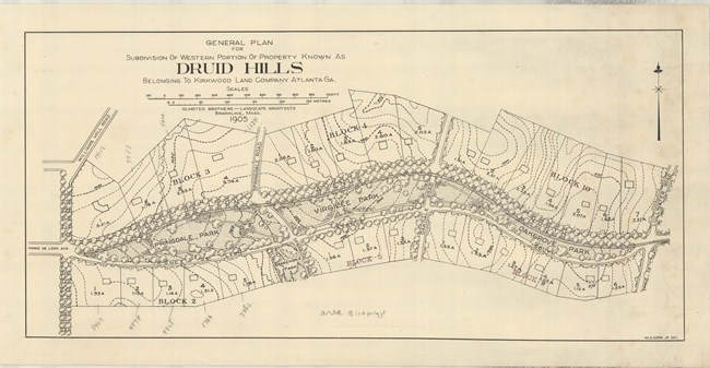 Plan for Druid Hills, which splits land up into lots each with a home on it, and a park running between two streets, which are lined with trees.