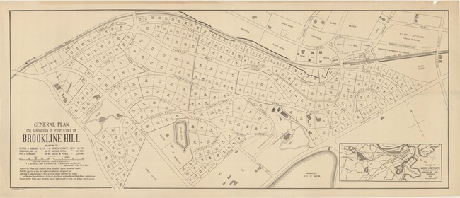 Pencil drawing of community under major road with curving roads around the community.