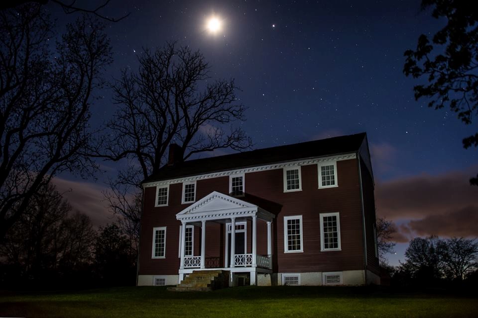 Ellwood Manor at night with the moon and stars Ellwood Manor at night with the moon and stars