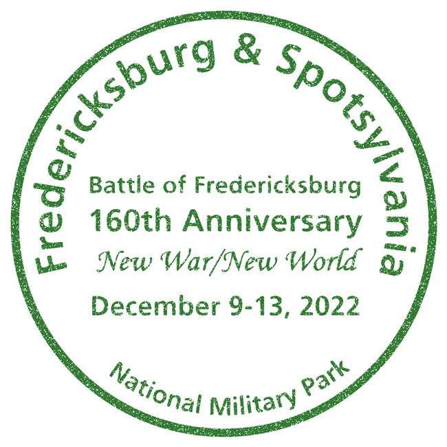 Virtual Visit Passport Stamp_Fredericksburg 160th A green circular park stamp with the park name around the edges, Fredericksburg and Spotsylvania National Military Park, and in the center, Battle of Fredericksburg, 160th Anniversary, New War/New World, December 9-13