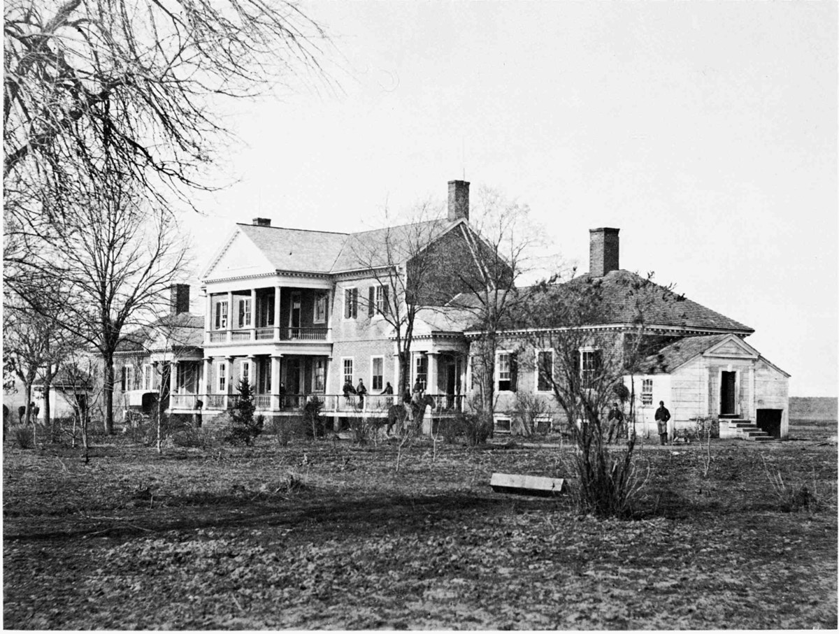 Chatham in 1863 Black and white photo of Chatham in 1863 with soldiers and wagons in front of the house