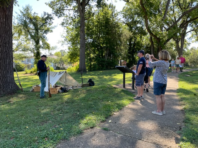 Sunken Road Living History A living history volunteer speaks with the public near the Sunken Road on the Fredericksburg Battlefield.