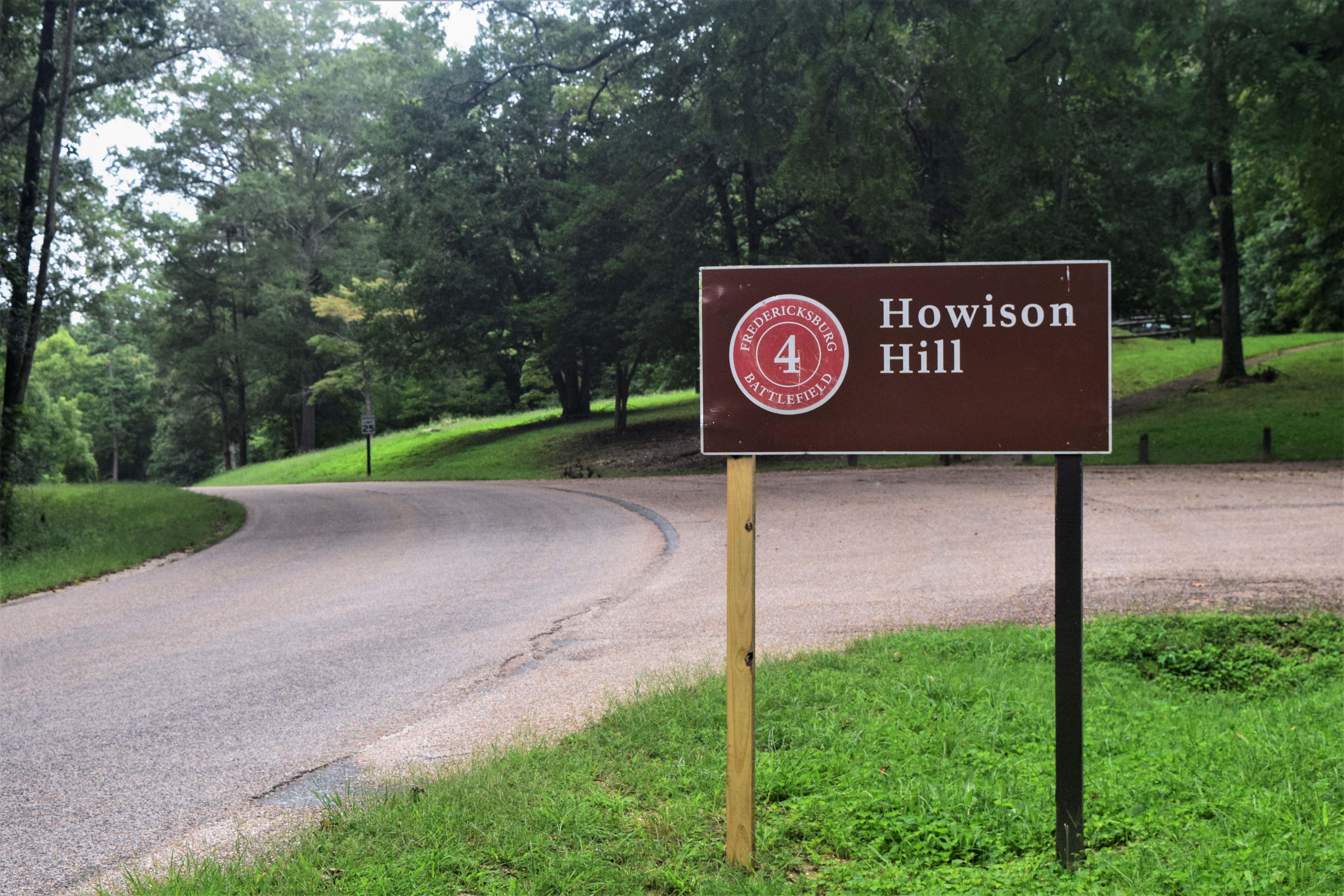 Park sign along a road for Howison Hill.