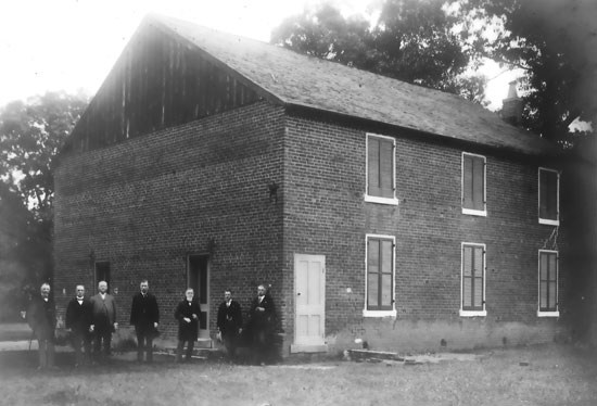 Civil War Veterans standing next to Salem Church Civil War Veterans standing next to Salem Church