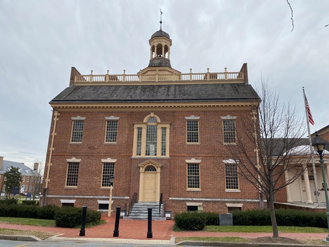 A colonial brick building.