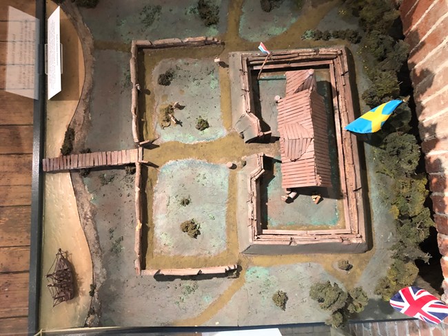 A birds eye view, of a diagram of a fort with the Swedish and English Flag showing.