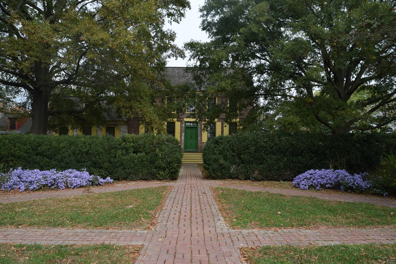 Three brick paths in front of the John Dickinson Mansion