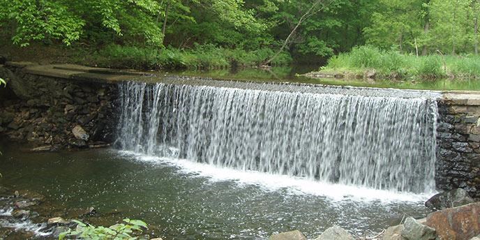 Brandywine Creek flowing over a dam.